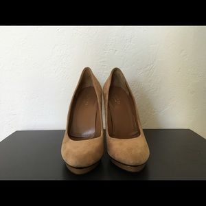 Gucci nude suede platform pumps with bamboo heel.
