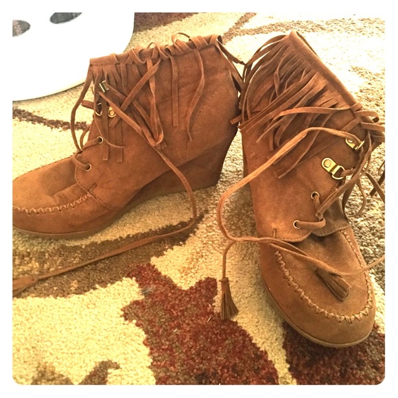 Lace up fringe booties