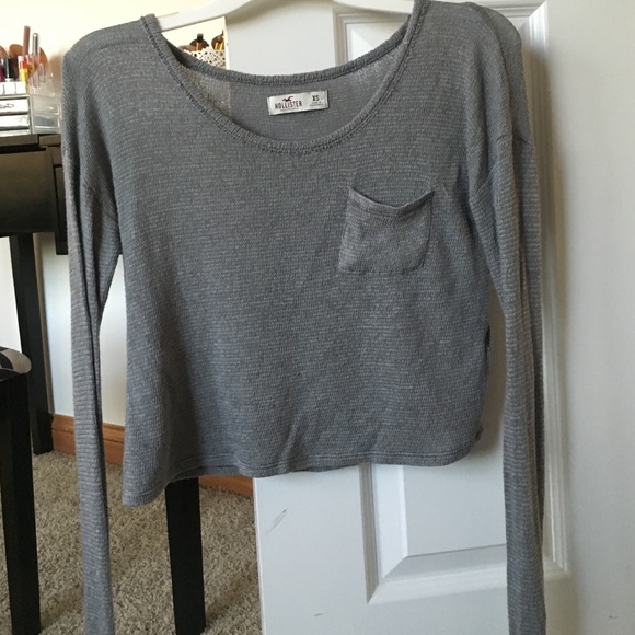 Light grey cropped sweater.