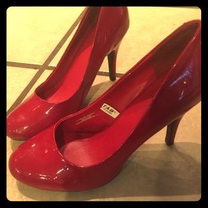 Size 7 red high heels.