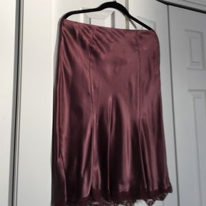 Bias cut hem satin party skirt.