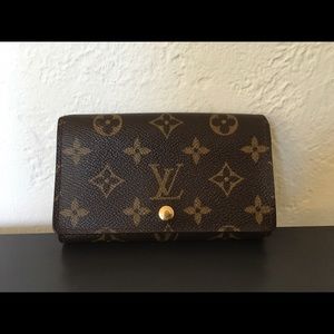 Louis Vuitton monogram canvas compact wallet.