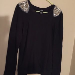 Black long sleeve sweater.