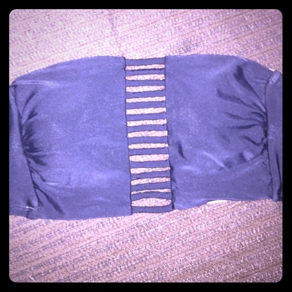 Swim suit top with tags.