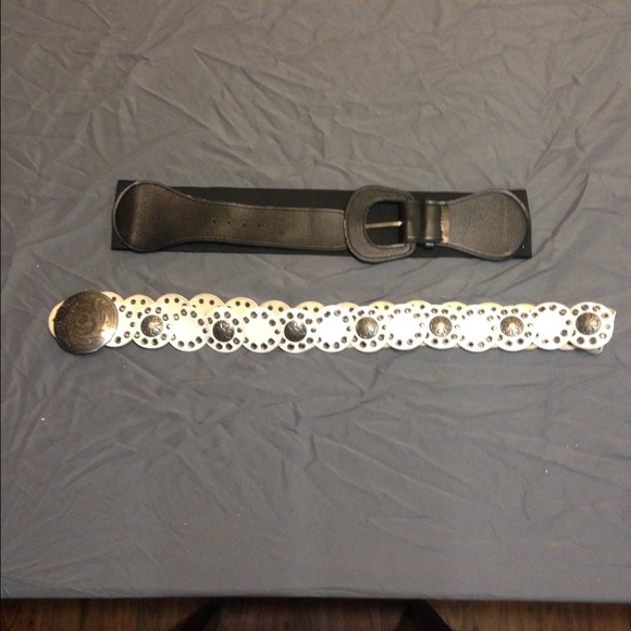 Black waist belt and a white belt