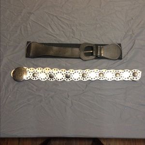 Black waist belt and a white belt