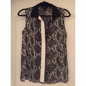 Black and white button down sleeveless top