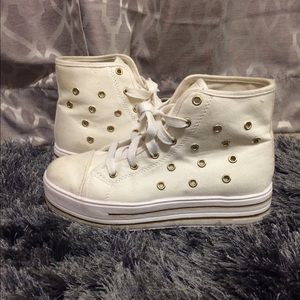Platform high-top sneakers. Platform high-top sneakers.