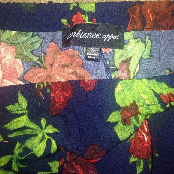 Blue with peachy, red flowers. loose shorts