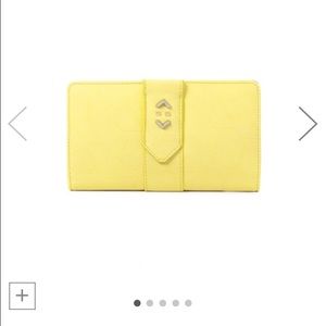 Stella and dot wallet. New, never used. Yellow.