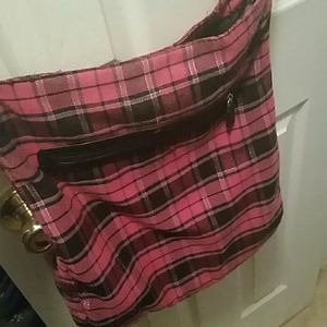 Pink plaid crossbody bag.