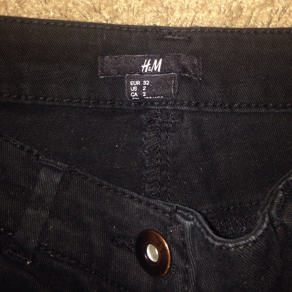 Black h&m shorts with design on the sides