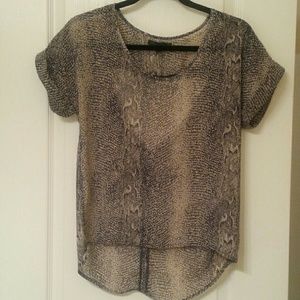 Snake print blouse cut out back. High in front,  l