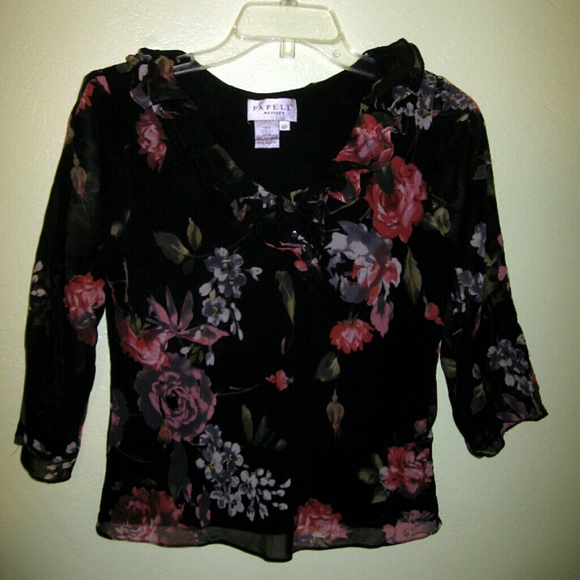 black top with flower pattern and ruffle