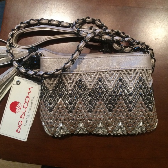 Convertible 3 way dressy purse/wristlet.