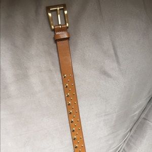 Leather belt with gold embellishments