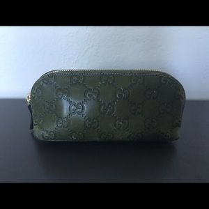 Gucci guccissima leather cosmetic case.