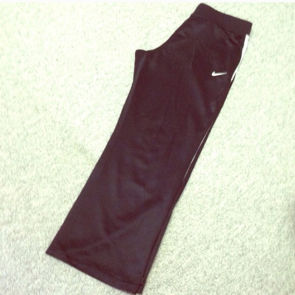 1 pair black and 1 pair blue nike sweatpants