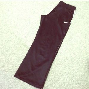 1 pair black and 1 pair blue nike sweatpants