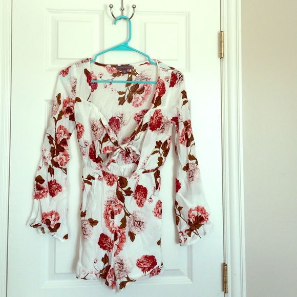 Never been worn floral romper.