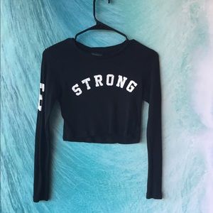 "Strong" crop top never worn before.
