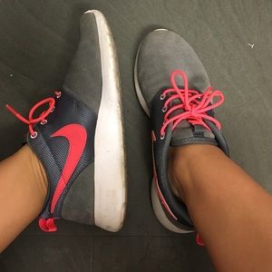 Grey and salmon Nike Roshe runs