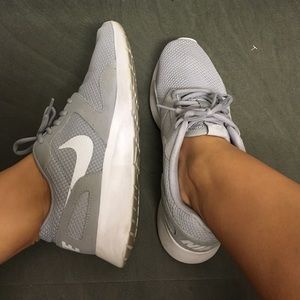 Grey and white Nike's