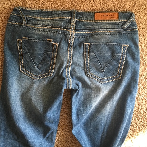 Medium light wash Vigoss collection jeans.