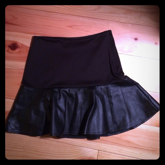Black skater/mini skirt w/ faux leather ruffle hem