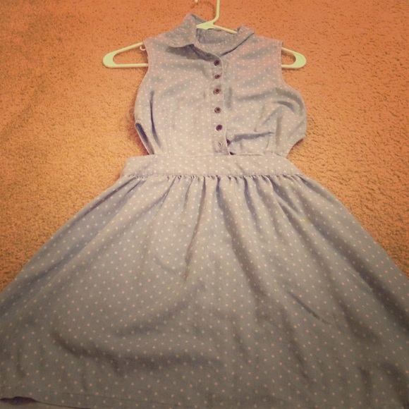 Cute Polkadotted dress with a little side cuts