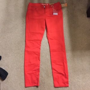 Red/orange skinny jeans