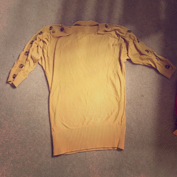 Mustard colored long sleeve.