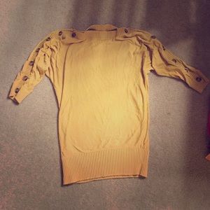 Mustard colored long sleeve.