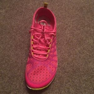 Pink Merrell running shoe