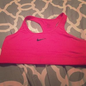 Hot pink Nike sports bra