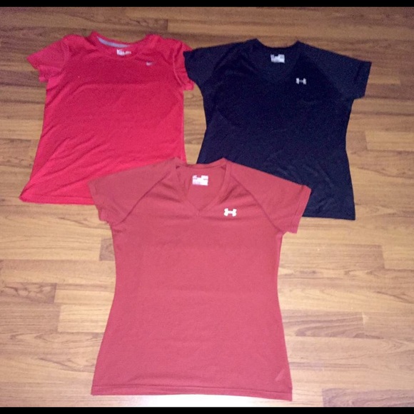 2 ladies under Armour shirts 1 Nike dri fit shirt