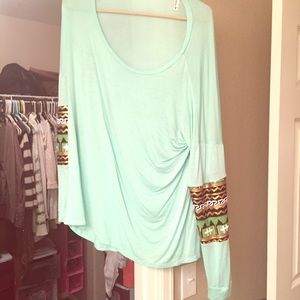 Cute loose fitting teal shirt