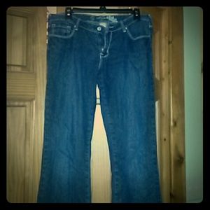 Dark wash jeans with glitter thread detail