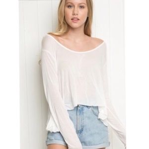 white flowy long sleeve shirt