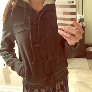 Green warm jacket with fuzzy hood