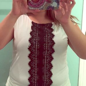 Beautiful white top with black lace.