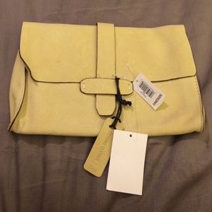 Adorable mustard leather clutch