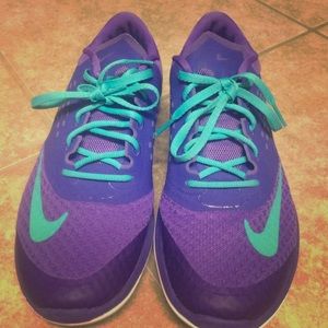 Purple and teal Nike's