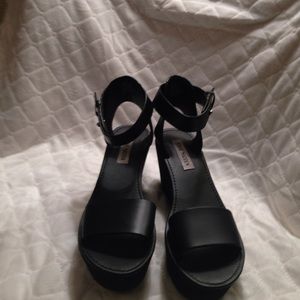 Black leather Steve Madden wedges