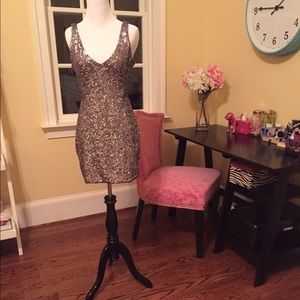 Silver sequined mini dress.