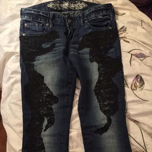 Faded blue, lace skinny jeans