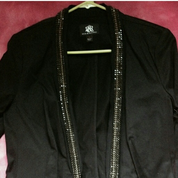 Pink pants, blazer, lipstick