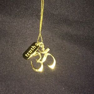 OM necklace.