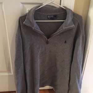 Polo half zip up mans sweater.