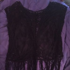Black see through shirt with fringe.